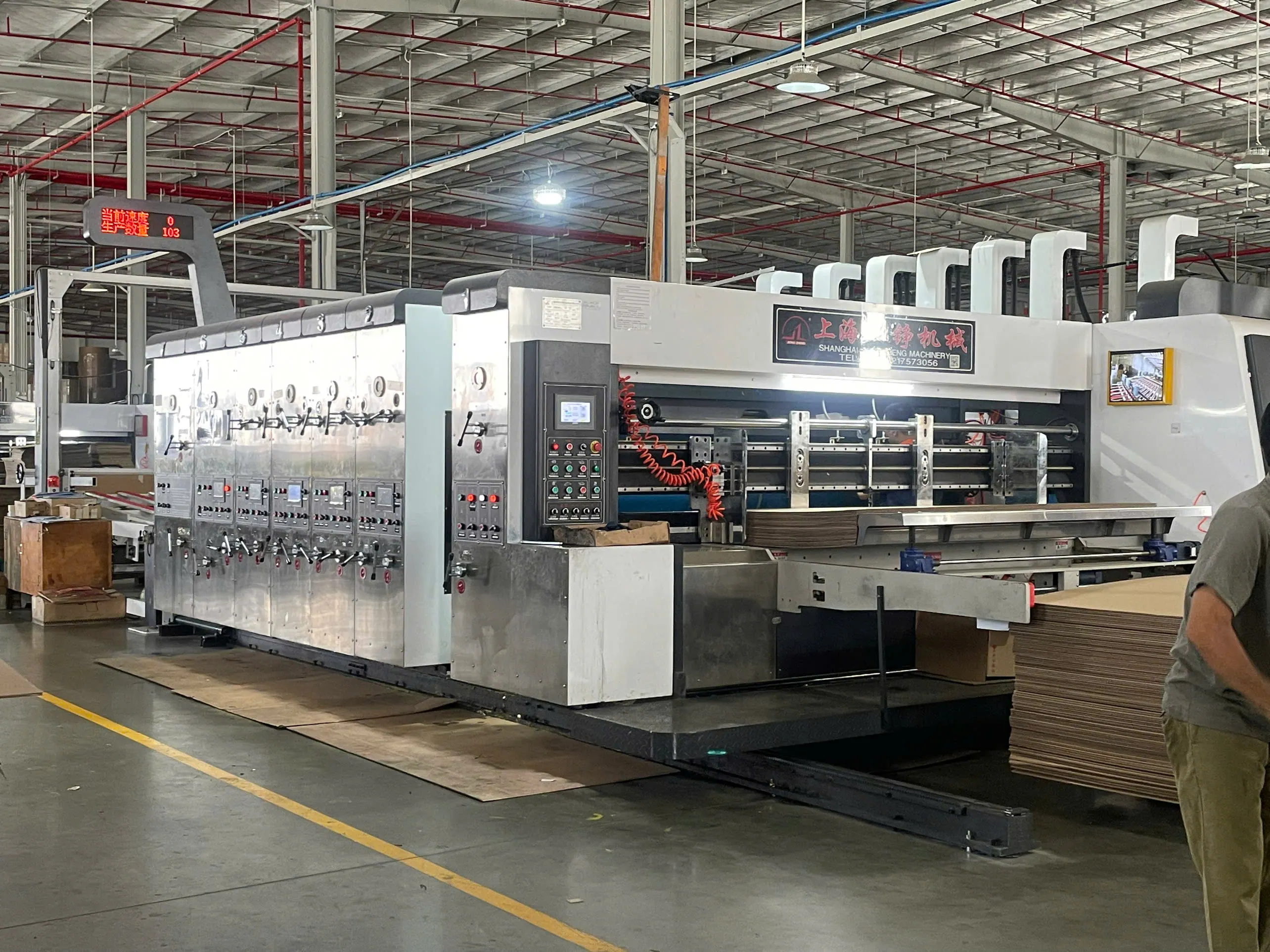 Printed packaging production machine